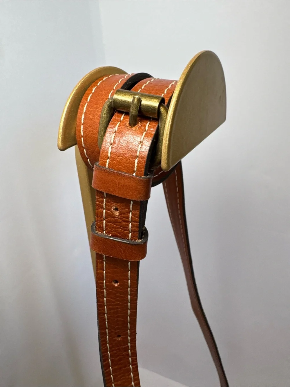 Patricia Nash Bonella Mini Crossbody Saddle Bag in their signature tan/cognac